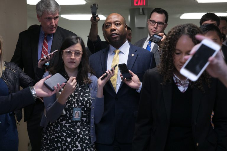 Senator Tim Scott, R-SC, takes questions from reporters on Capitol Hill, Thursday, November 29, 2018.