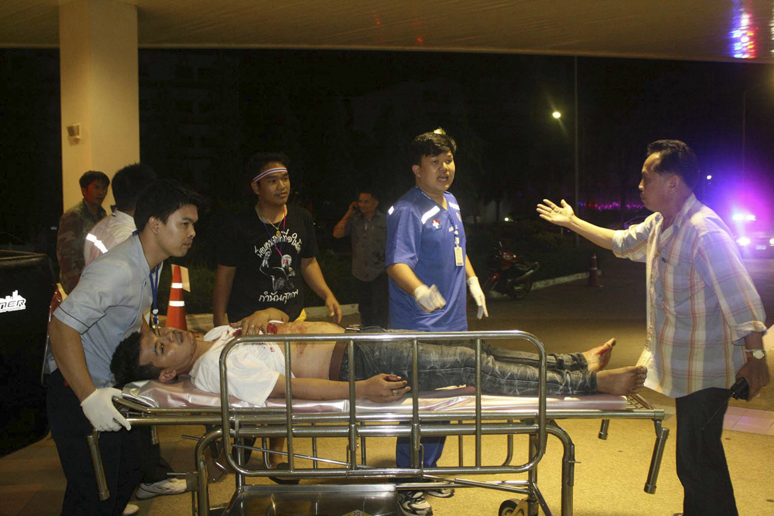Girl killed, dozens hurt in attack on Thai protest