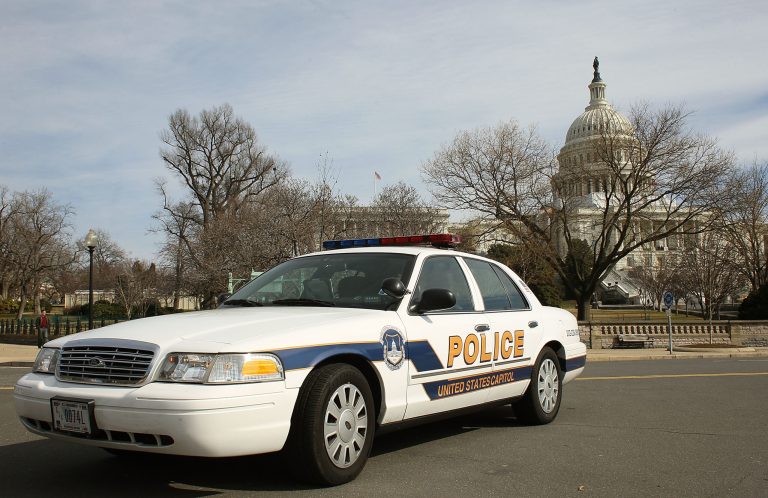 In this file photo from 2012, A police car sits in front of the U.S. Capitol building. (Photo by Mark Wilson/Getty Images)