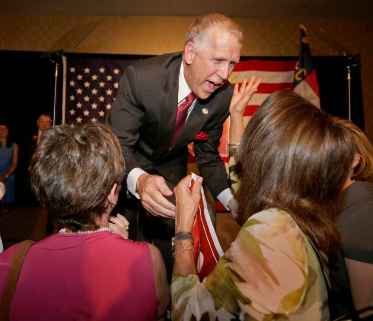 Thom Tillis greets supporters at an election night rally in Charlotte, N.C., after winning the Republican nomination for the U.S. Senate, Tuesday, May 6, 2014. (AP Photo/Chuck Burton)
