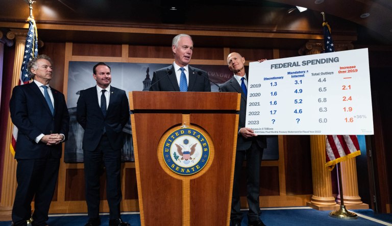 A group of Republican senators, from left, Rand Paul, R-KY, Mike Lee, R-UT, Ron Johnson, R-WI, and Rick Scott, R-FL, tell reporters that they want a clean CR that extends government funding until after the new Congress begins in 2023 at the Capitol in Washington, Wednesday, Dec. 7, 2022. 