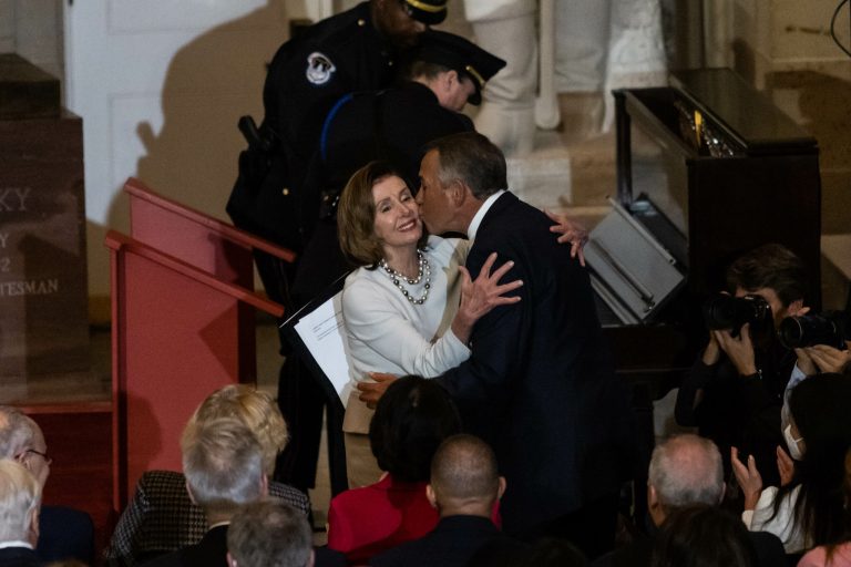 Boehner shares a smooch with Pelosi: Washington Photos of the Week