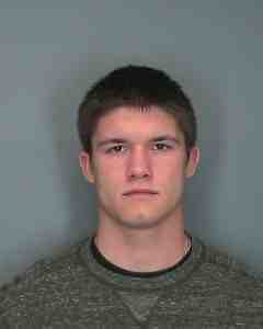 This photo provided by Ithica Police shows Peter Mesko of Honesdale, Pa. Mesko, a 22-year-old Cornell University wrestler, has been charged after a woman said she woke up to find him raping her, and the woman's partner later took a photo that led to his arrest. Mesko, of Honesdale, Pa., was charged Tuesday, April 2, 2013 with first-degree rape and was freed on $5,000 bail. (AP Photo/Ithica Police)
