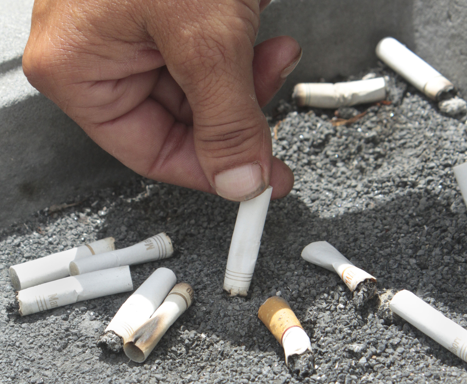 Cigarette smoking rates drop to record low