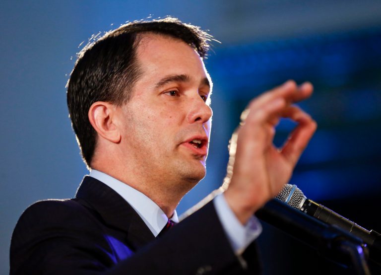 Wisconsin Gov. Scott Walker argued the state's fight over same-sex marriage is now over, after the U.S. Supreme Court failed to take up an appeal of a lower court decision. (AP Photo/Kamil Krzaczynski)