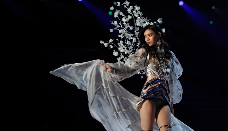 Chinese model Ming Xi presents a creation during the Victoria's Secret fashion show at the Mercedes-Benz Arena in Shanghai, China on Monday, Nov. 20, 2017.