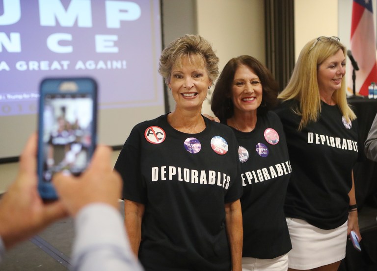 A member of the audience snaps a photo of the 