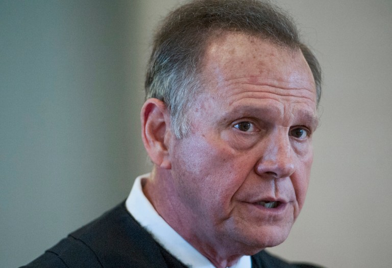Moore faces ouster to ordering probate judges to ignore law. (Mickey Welsh/Montgomery Advertiser via AP)