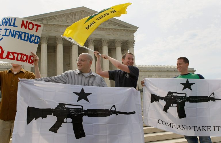 Gun rights activists react to the U.S. Supreme Court's decision on on June 26, 2008, to strike down D.C.'s gun ban. (Photo by Mark Wilson/Getty Images)