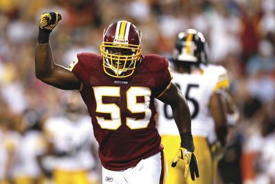 Patrick Semansky/AP
On Friday, the Washington Redskins re-signed linebacker London Fletcher, who was an unrestricted free agent. Fletcher led the NFL in tackles in 2011.