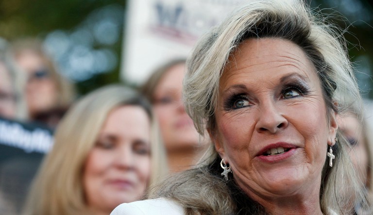 Kayla Moore spoke to a crowd of Moore-supporting women and TV cameras in Montgomery. (AP Photo/Brynn Anderson)