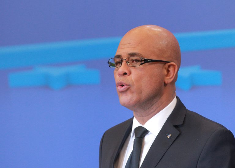 In this Feb. 25, 2014, file photo, Haiti's President Michel Martelly addresses the media at the European Council building in Brussels.  President Martelly announced Tuesday, May 6,2014, that he has appointed a new council to oversee Haitian legislative and local elections that are two years overdue, an important step to organizing a vote whose tardiness has frustrated many. (AP Photo/Yves Logghe, File)