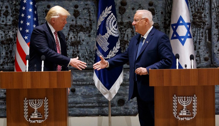 Israeli President Reuven Rivlin welcomed President Trump to Israel on Monday by saying he was glad to see America back in the neighborhood. (AP Photo/Evan Vucci)