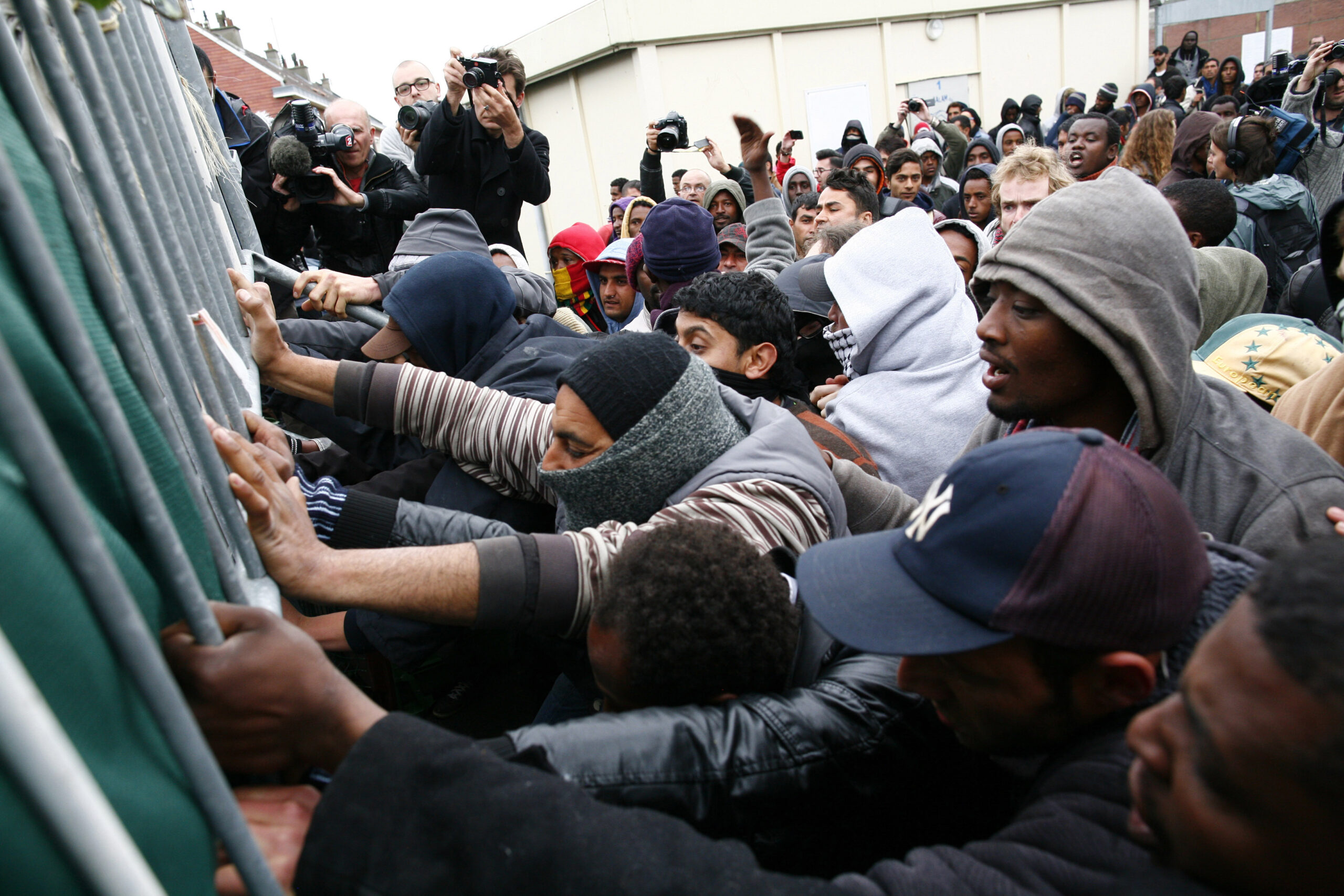 Migrants clash in France as camp tensions soar