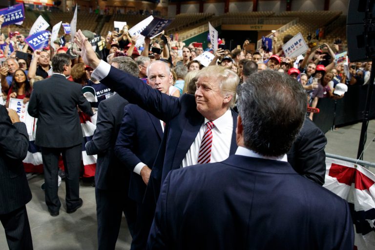 Republican presidential candidate Donald Trump waves to the crowd as he leaves a campaign rally, Thursday, Aug. 11, 2016, in Kissimmee, Fla. (AP Photo/Evan Vucci)