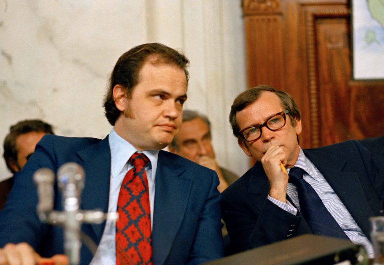 FILE - This May 17, 1973 file photo shows Sen. Fred D. Thompson, Chief Minority Counsel of the Senate Watergate Committee, left, talking with Sen. Howard Baker, R-Tenn. during the Watergate hearings on Capitol Hill in Washington. . Baker, who asked what President Richard Nixon knew about Watergate, has died. He was 88. Baker, a Republican, served 18 years in the Senate. He earned the respect of Republicans and Democrats alike and rose to the post of majority leader. He served as White House chief of staff at the end of the Reagan administration and was U.S. ambassador to Japan during President George W. Bush's first term.   (AP Photo, File)