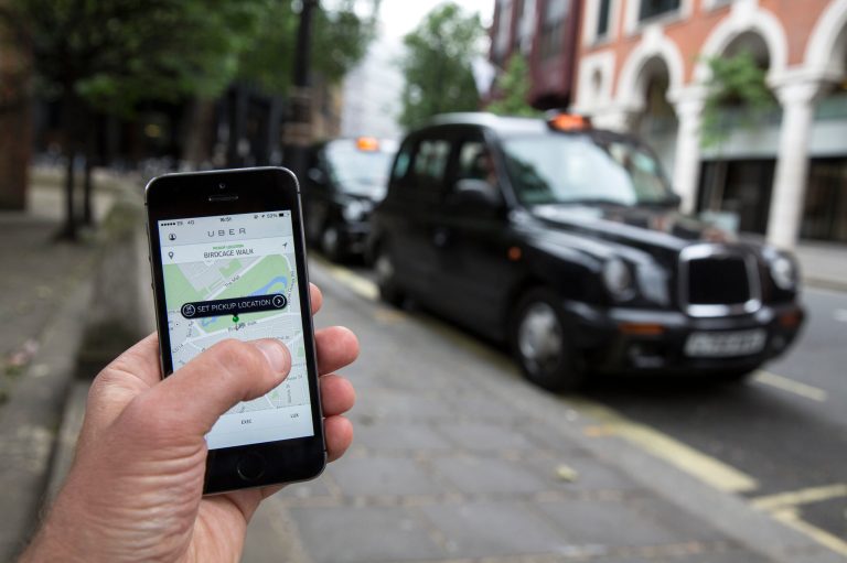 The bad publicity Uber gets from criminal drivers gives it a powerful incentive to take strong measures to avoid them.Â (Photo by Oli Scarff/Getty images)