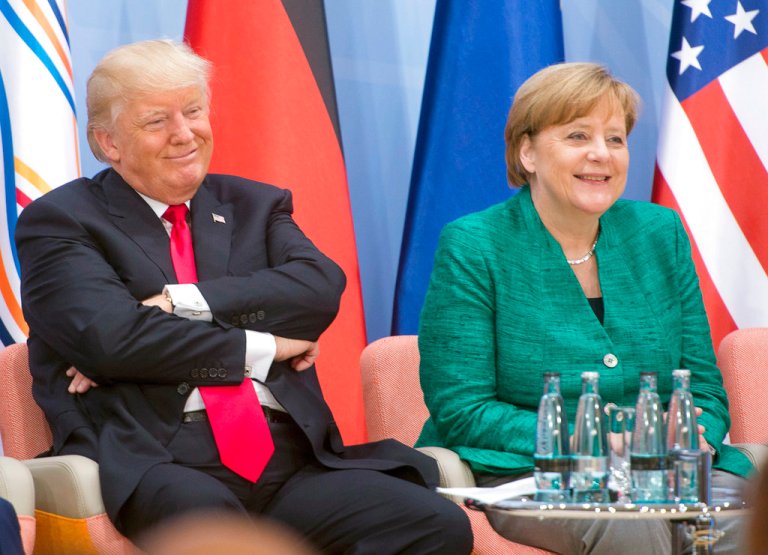 United States President Donald Trump, left, and German Chancellor Angela Merkel take part in a Women and Development event at the G20 summit Saturday, July 8, 2017 in Hamburg, Germany. (Ryan Remiorz/The Canadian Press via AP)