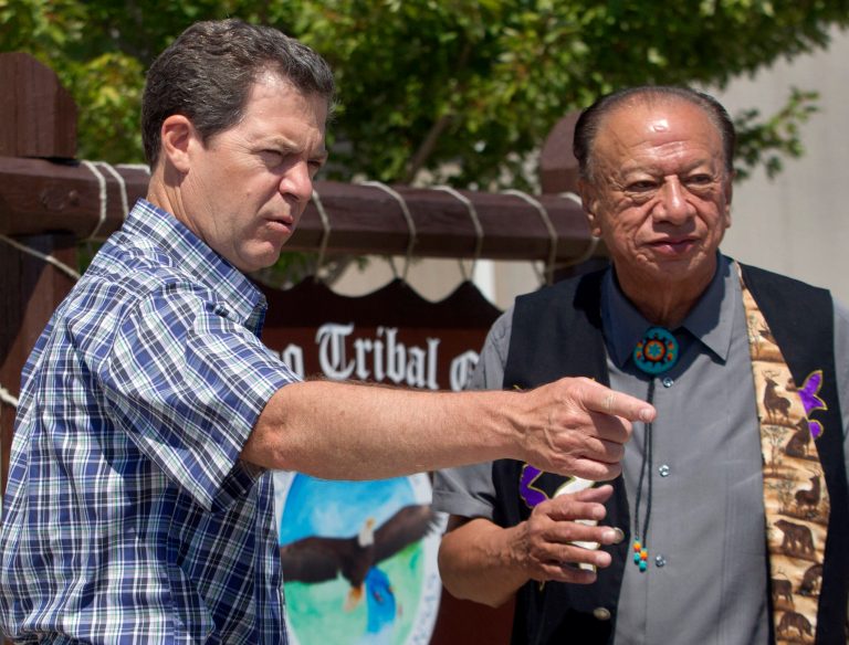 Gov. Sam Brownback talks with Kickapoo chairman Steve Cadue at the tribal offices in Horton, Kan., Wednesday, Aug. 8, 2012. (AP File)