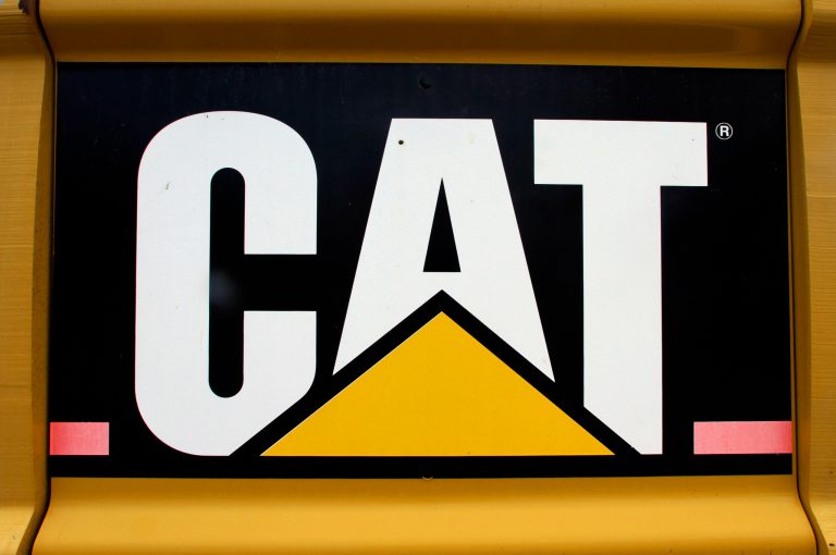 FILE - In this June 13, 2012 file photo, the Caterpillar logo is seen on earth moving equipment in Springfield, Ill. A spokesperson for Caterpillar Inc. said Thursday, June 13, 2013, the Peoria, Ill-based heavy equipment maker it will no longer give money to the Boy Scouts of America because the organization bars homosexual adults from serving as scout leaders. (AP Photo/Seth Perlman, File)