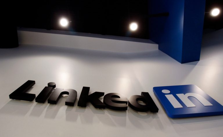 FILE - In this May 19, 2011 file photo,the LinkedIn logo is displayed in the foyer at headquarters in Mountain View, Calif. (AP Photo/Paul Sakuma, File)