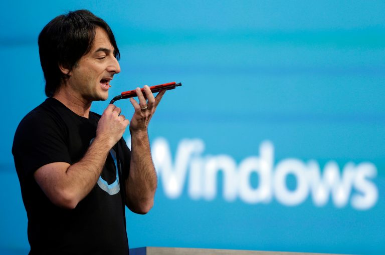 FILE - In this April 2, 2014 file photo, Microsoft corporate vice president Joe Belfiore, of the Operating Systems Group, demonstrates the new Cortana personal assistant during the keynote address of the Build Conference in San Francisco. Belfiore on Wednesday, July 30, 2014 said in Beijing that Chinese and British users of Windows Phones will get the voice-recognizing app in an update to Windows Phone 8.1 that will begin rolling out to developers next week and to users in the coming months. (AP Photo/Eric Risberg, File)
