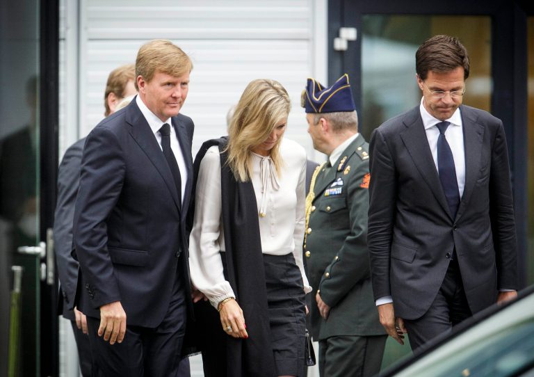 Dutch King Willem-Alexander, left, Queen Maxima, center, and Dutch Prime Minister Mark Rutte, far right, leave a meeting in Nieuwegein, near the central city of Utrecht, Netherlands, Monday, July 21, 2014. Relatives of Dutch victims killed in the downing of Malaysia Airlines Flight 17 were meeting Monday afternoon with their king, queen and prime minister amid growing anger at the treatment of their loved ones' bodies by pro-Russian rebels in Ukraine. In an unusual move that underscored the severity of the national trauma, a somber King Willem-Alexander gave a brief televised address to his country after meeting grieving relatives. 