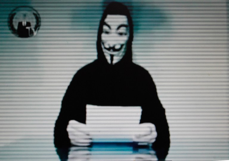 Hacking collective Anonymous took credit for a Twitter outage early Monday. (AP Photo/Petros Giannakouris)