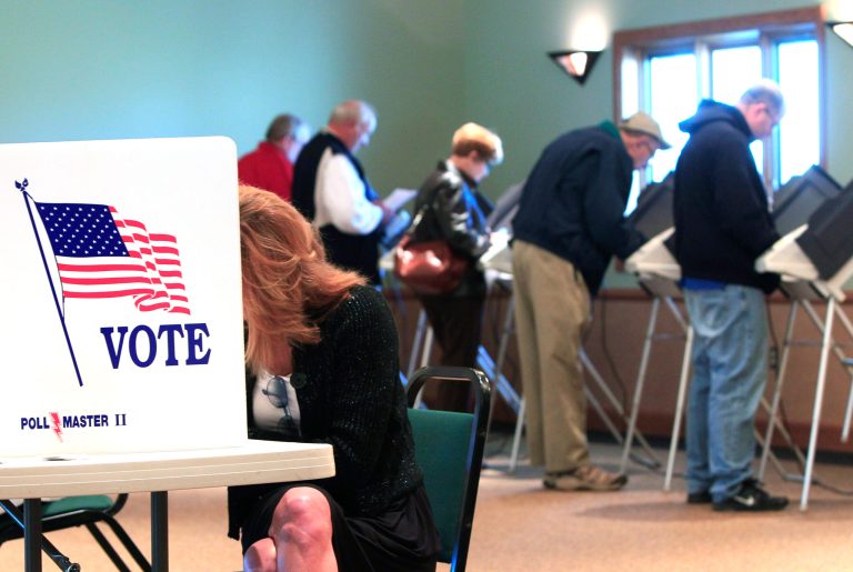 A steady stream of voters fill the voting booths at Ronald Reagan Lodge on Nov. 6, 2012, in West Chester, Ohio. (AP Photo/Al Behrman)