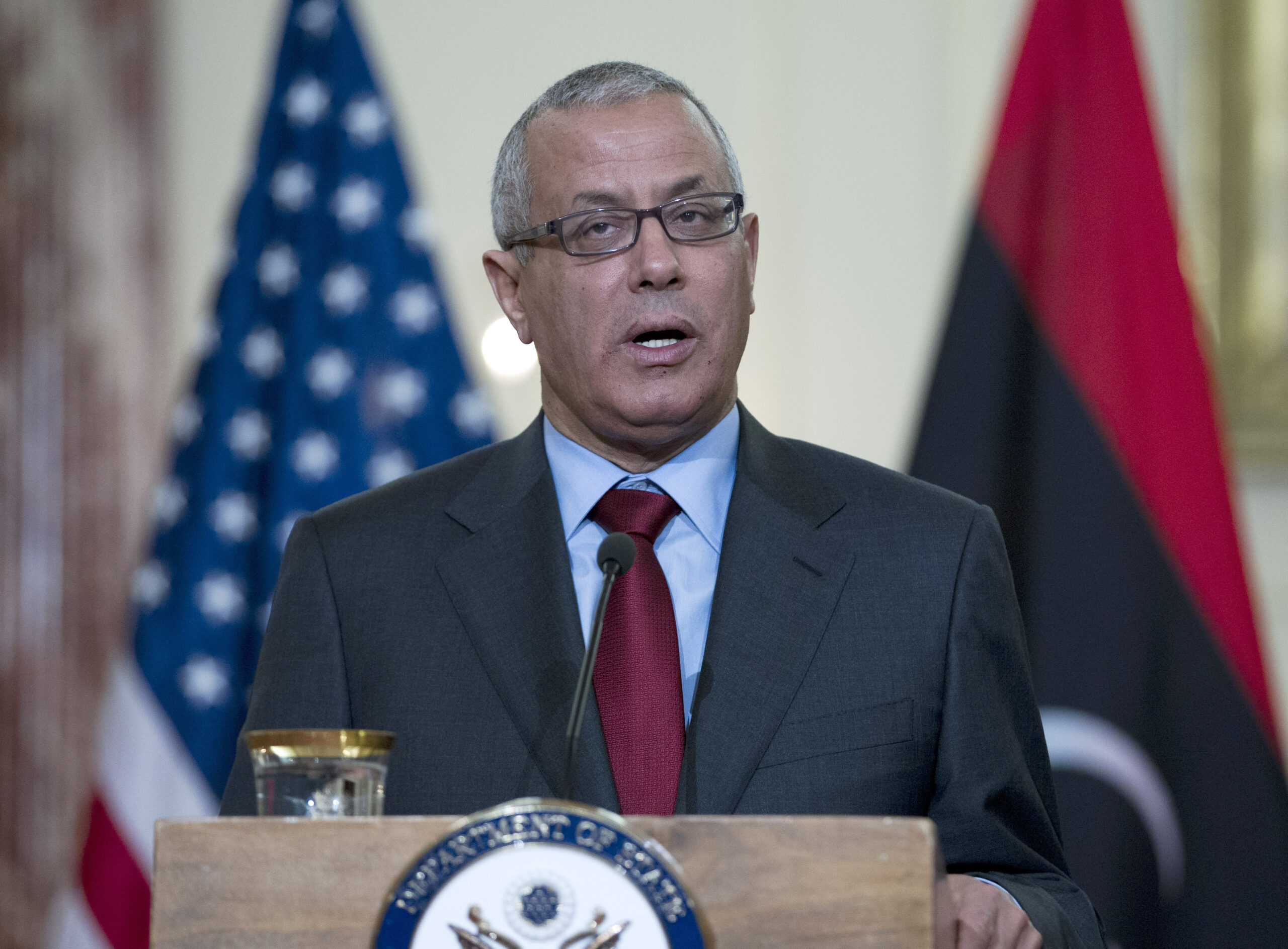 Storming ministries, Libya’s militias put pressure