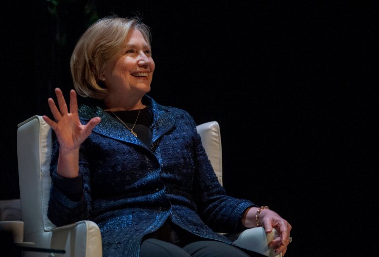 Former U.S. Secretary of State Hillary Rodham Clinton laughs after people questioned about a presidential run while she speaks to a crowd in Saskatoon, Saskatchewan, earlier this year. (AP Photo/The Canadian Press, Liam Richards)