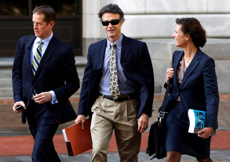 Kurt Mix, center, arrives at the Hale Boggs Federal Building in New Orleans, Tuesday, Dec. 3. (AP/Jonathan Bachman)