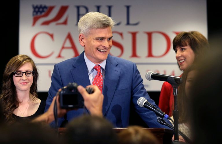 Louisiana Republican Senate candidate Rep. Bill Cassidy, R-La., addresses supporters during his election night watch party in Baton Rouge, La., Tuesday, Nov. 4, 2014. At left is his daughter Meg Cassidy, and right is his wife Laura Cassidy. Cassidy and Landrieu will face each other in a runoff. (AP Photo/Gerald Herbert)