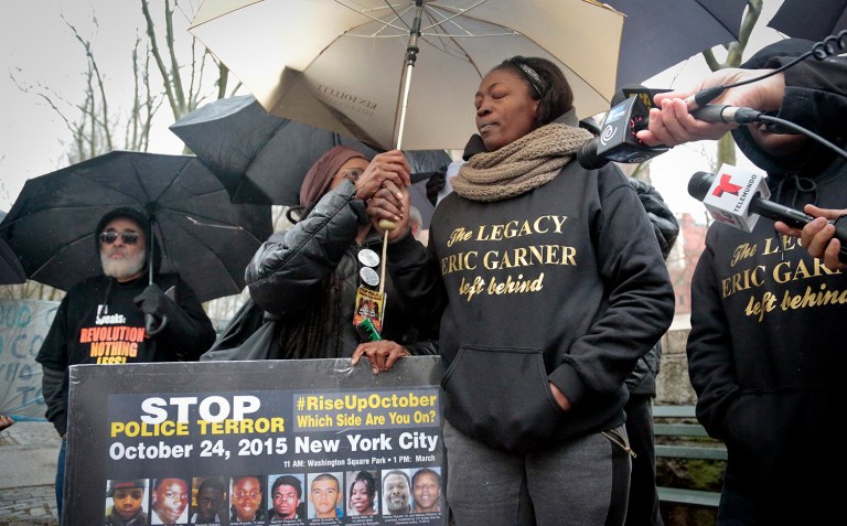 Jewel Miller, right, mother of Eric Garner's daughter Legacy, speaks during a rally calling for the prosecution of NYPD officer Daniel Pantaleo in the chokehold death of Garner, Wednesday, Feb. 24, 2016, in New York. (AP Photo/Bebeto Matthews)