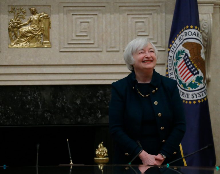 Janet Yellen is applauded after she was administered the oath of office as Federal Reserve Board Chair, the first woman to lead the Federal Reserve, at the Federal Reserve in Washington, Feb. 3. (AP Photo/Charles Dharapak)