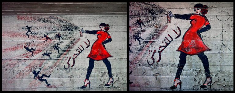 FILE- This combination of two photos shows graffiti of a woman with the words 