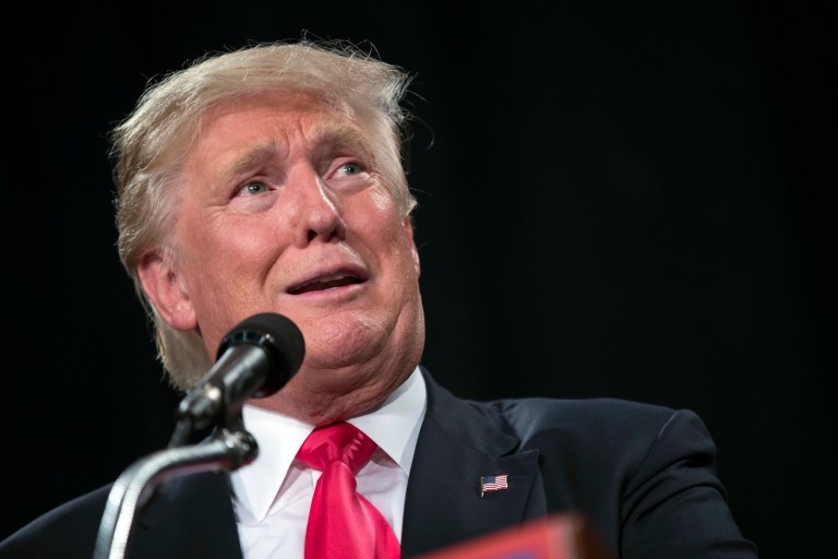 A new online poll says Donald Trump gained no ground following the Republican National Convention. (AP Photo/Evan Vucci)