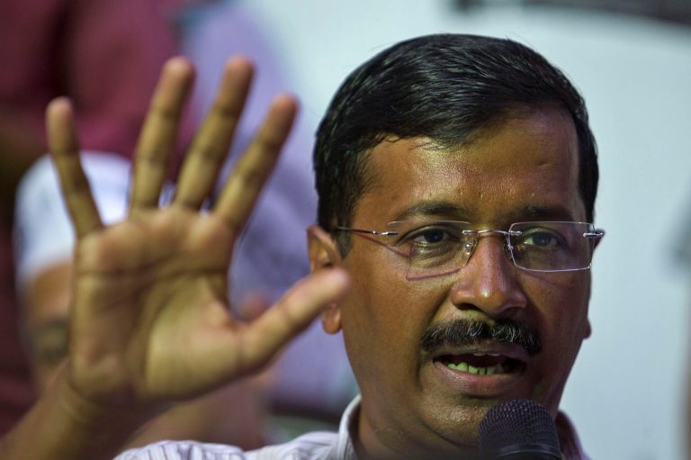 Aam Aadmi Party (AAP), or common man party, chief Arvind Kejriwal speaks after releasing his party manifesto ahead of the general elections in New Delhi, India, Thursday, April, 3, 2014. India will hold national elections from April 7 to May 12, kicking off a vote that many observers see as the most important election in more than 30 years in the world's largest democracy. (AP Photo/Tsering Topgyal)