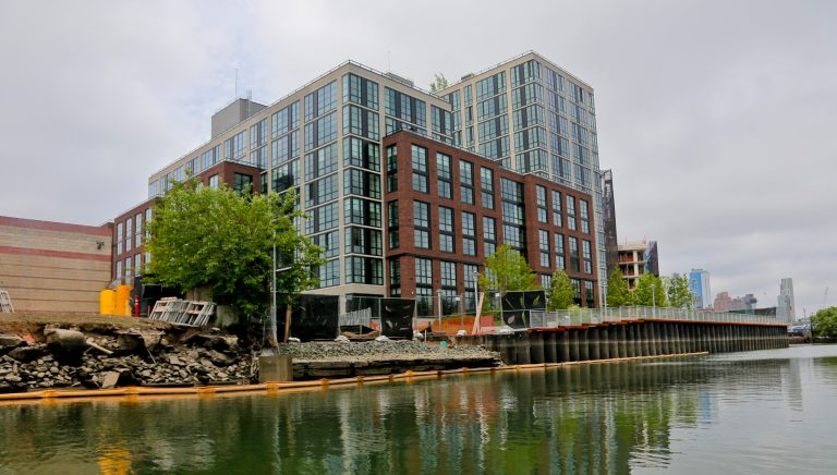 A view of the new 365 Bond Street apartments, a new development from Lightstone, along Brooklyn's Gowanus Canal, in New York. (AP Photo/Bebeto Matthews)
