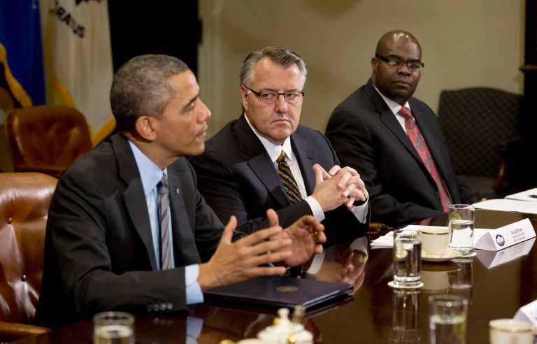 President Barack Obama meets with business leaders to discuss immigration reform, Tuesday, Nov. 5, in the Roosevelt Room of the White House in Washington. From left are, the president, Motorola CEO Greg Brown, and McDonald's President and CEO Don Thompson. (AP/Pablo Martinez Monsivais)