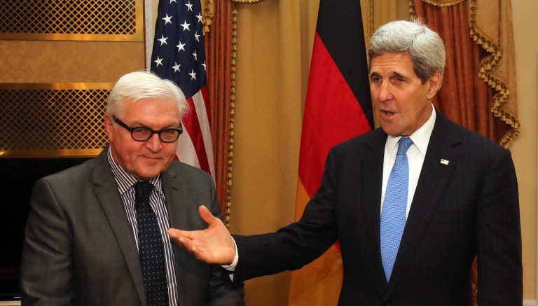 German Foreign Minister Frank-Walter Steinmeier and U.S. Secretary of State John Kerry, from left, talk during closed-door nuclear talks with Iran in Vienna, Austria, Saturday, Nov. 22, 2014. (AP Photo/Ronald Zak)