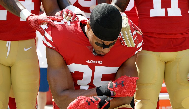 San Francisco 49ers safety Eric Reid (pictured center) was asked if he was "concerned" if his kneeling protest would affect his prospects as a free agent.