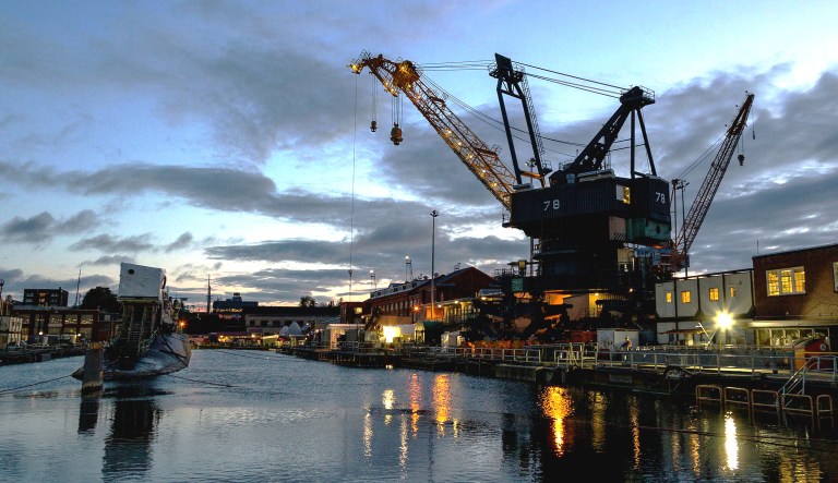 The sun sets over the ballistic missile submarine USS Ohio on April 25, 2017 at the Puget Sound Naval Shipyard and Intermediate Maintenance Facility in Bremerton, Wash.