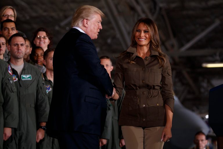 President Donald Trump shakes hands with first lady Melania Trump after being introduced to speak to military personnel and their families at Andrews Air Force Base, Friday, Sept. 15, 2017, in Andrews Air Force Base, Md. (AP Photo/Evan Vucci)