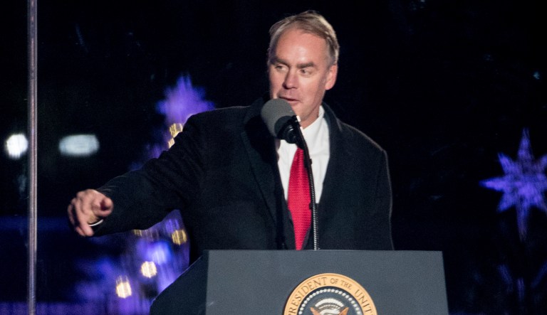 Ryan Zinke on Monday morning will sign a land swap deal to allow King Cove, Alaska, to build a road through a wildlife refuge to a neighboring town. (AP Photo/Andrew Harnik)