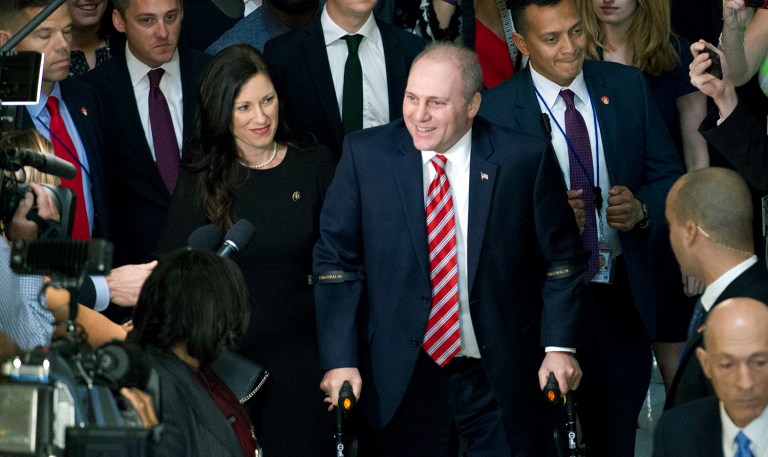 Upon returning to Congress, Scalise was welcomed by a standing ovation as he made his way to the House chamber. ( AP Photo/Jose Luis Magana)
