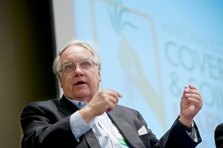 Philanthropist Howard G. Buffett, son of investor Warren Buffett, participates in a panel discussion at the conference on cover crops and soil health, in Omaha, Neb., Tuesday, Feb. 18, 2014. Buffett is sponsoring a national invitation-only conference on the benefits of cover crops in Omaha to get American farmers interested in keeping their soil healthy. (AP Photo/Nati Harnik)