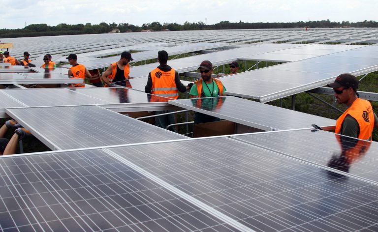 The Energy Department's revolution report says solar is becoming more cost competitive with natural gas and coal.Â (AP Photo/Bob Edme)