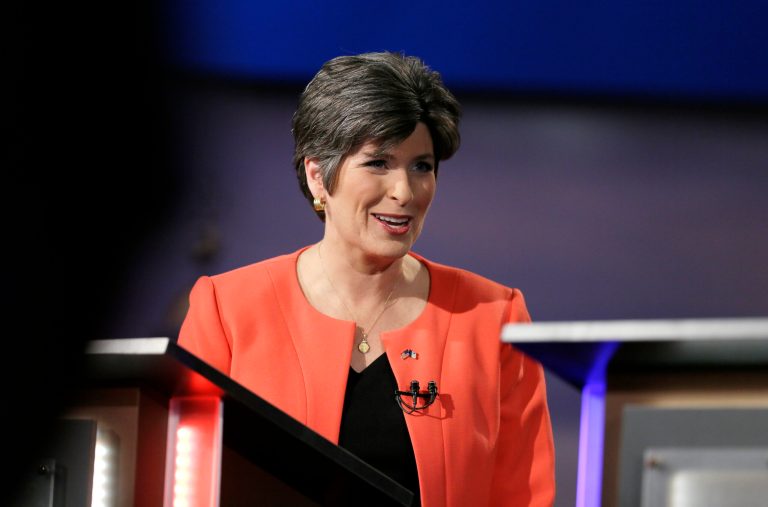 Iowa Republican senatorial candidate State Sen. Joni Ernst looks on before a live televised debate at Iowa Public Television studios, Thursday, April 24, 2014, in Johnston, Iowa. (AP Photo/Charlie Neibergall)