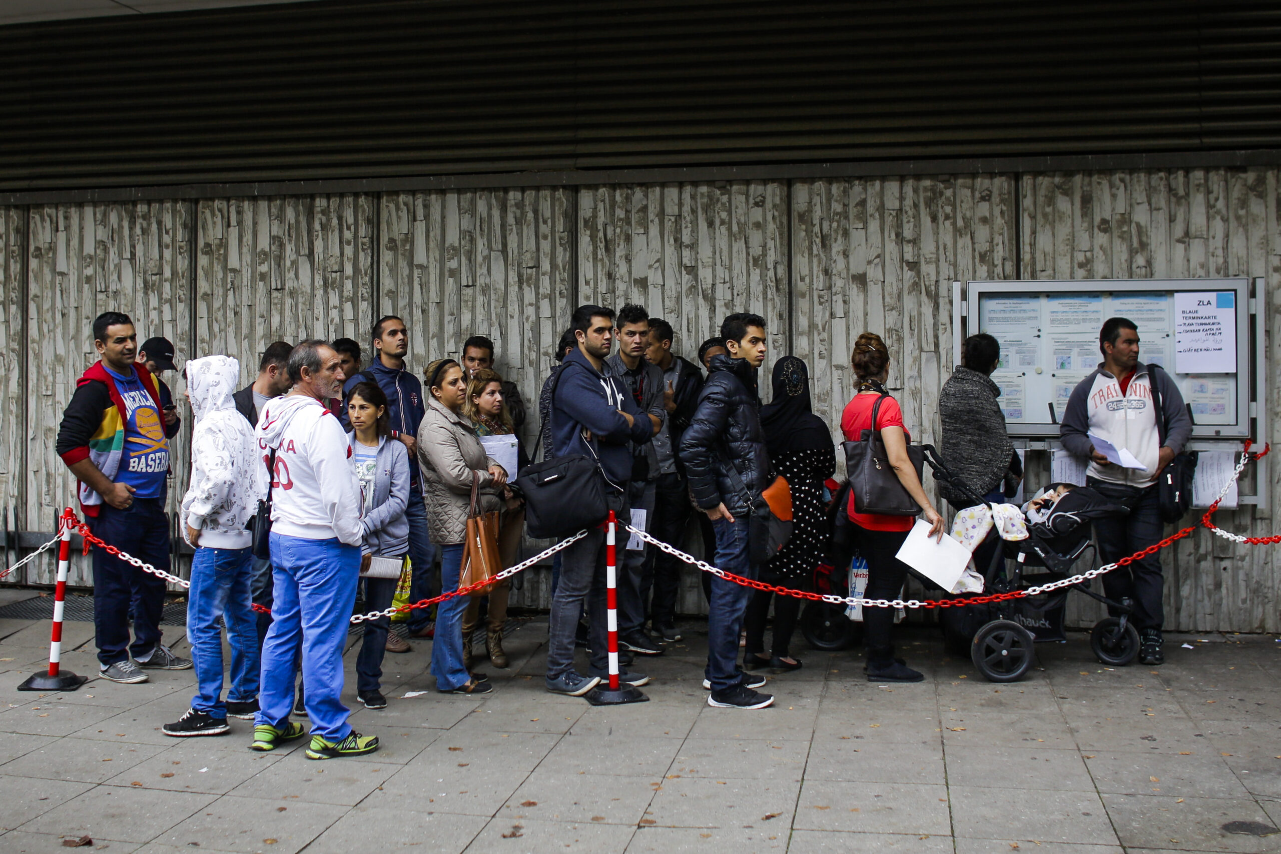 Germany vows better checks on refugee guards